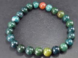 "Radiant Ruby Fusion: Natural Stone Bracelet Collection"