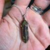 MystiQuill Dragon Blood Stone Double Pointed Pencil Crystal Pendant – Unleash Your Inner Magic!